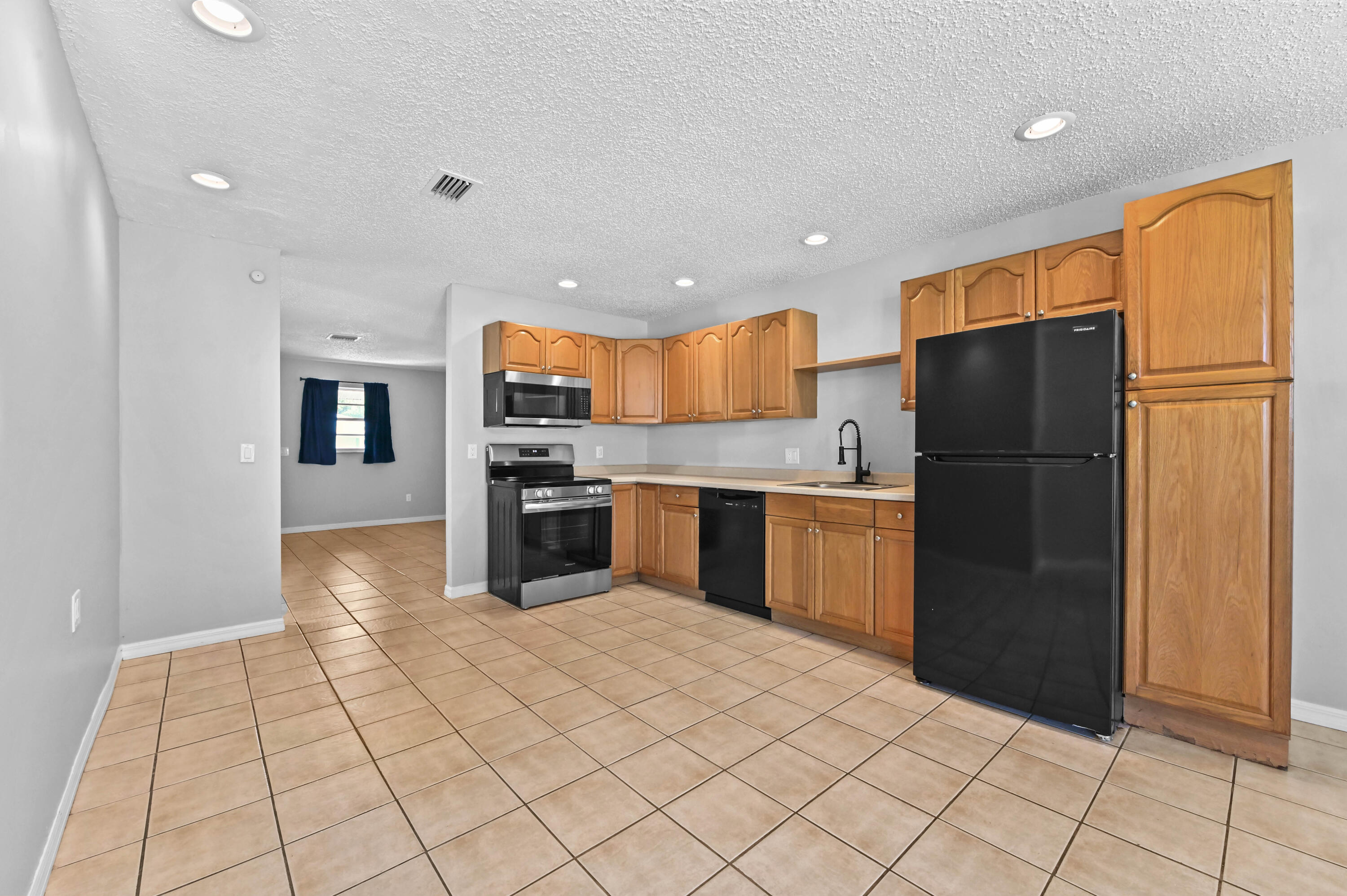 4548 Southeast Salvatori Road Stuart, FL 34997 - Photo 5 of 30 06 kitchen 02
