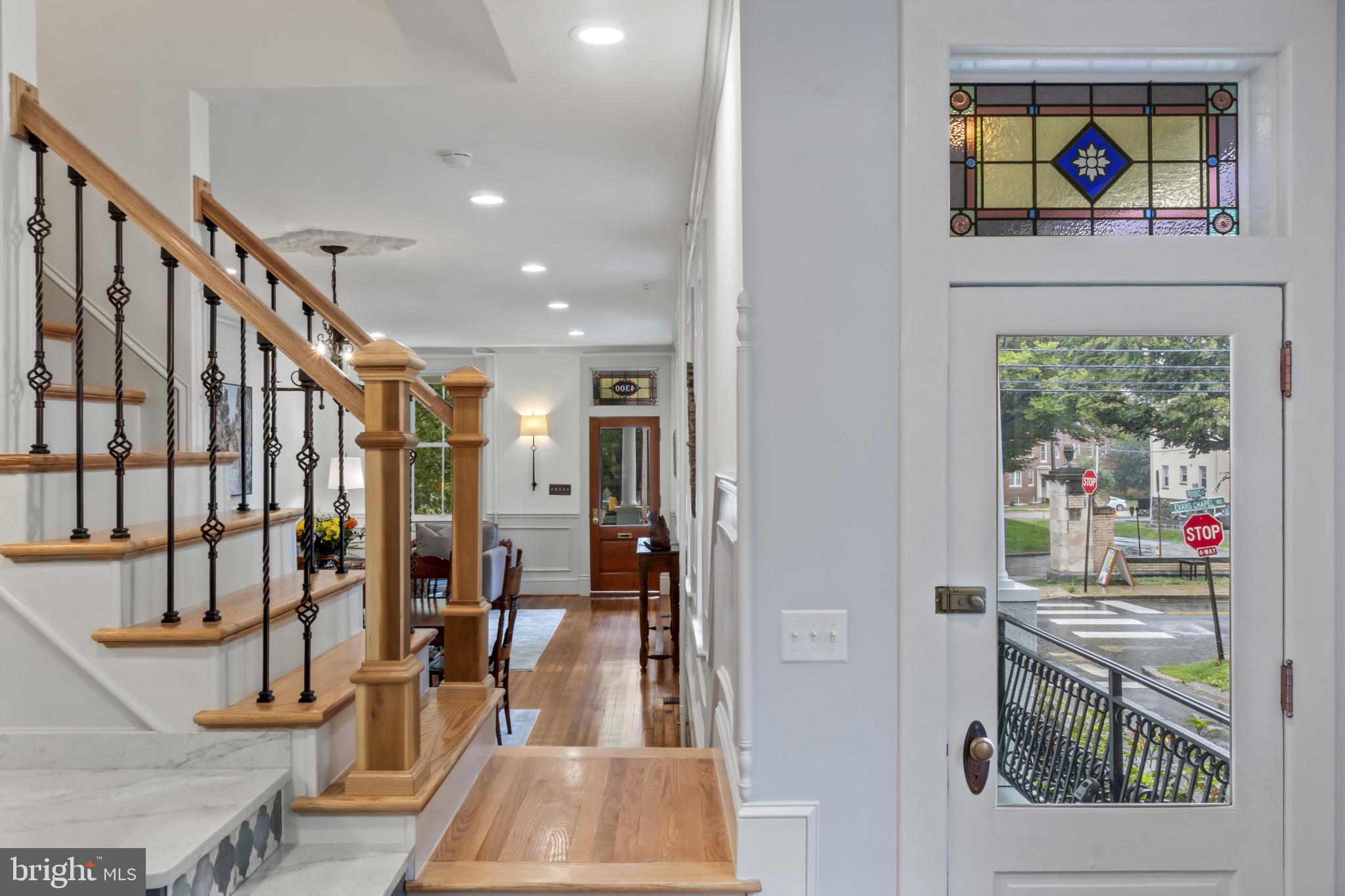 4300 Evans Chapel Road Baltimore, MD 21211 - Photo 13 of 40 a view of hallway with wooden floor and stairs