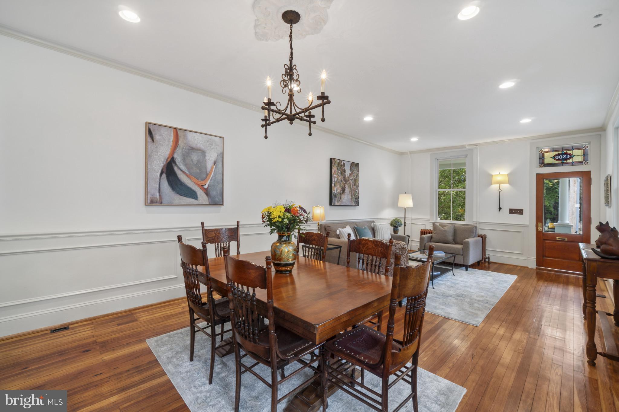 4300 Evans Chapel Road Baltimore, MD 21211 - Photo 8 of 40 a view of a dining room with furniture wooden floor and chandelier