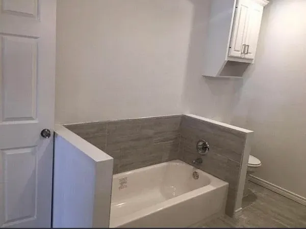 a bathroom with a bathtub