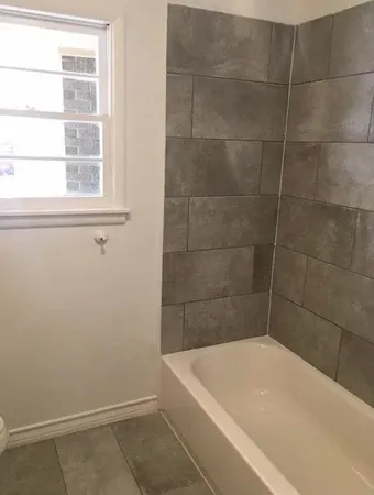 a bathroom with a bathtub
