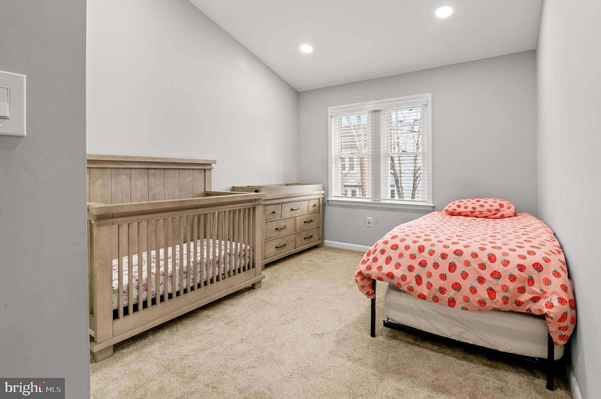 6939 Copper Bend Lane Baltimore, MD 21209 - Photo 11 of 18 a bedroom with a bed and window