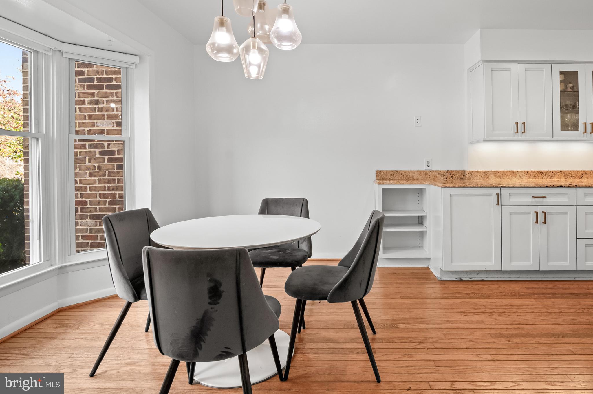 6939 Copper Bend Lane Baltimore, MD 21209 - Photo 6 of 18 a view of a dining room with furniture window and wooden floor