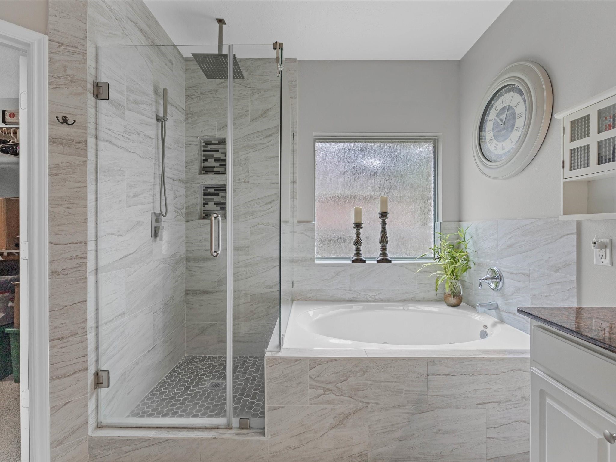 3310 Compass Court Conroe, TX 77301 - Photo 22 of 38 a spacious bathroom with a granite countertop bathtub and a shower