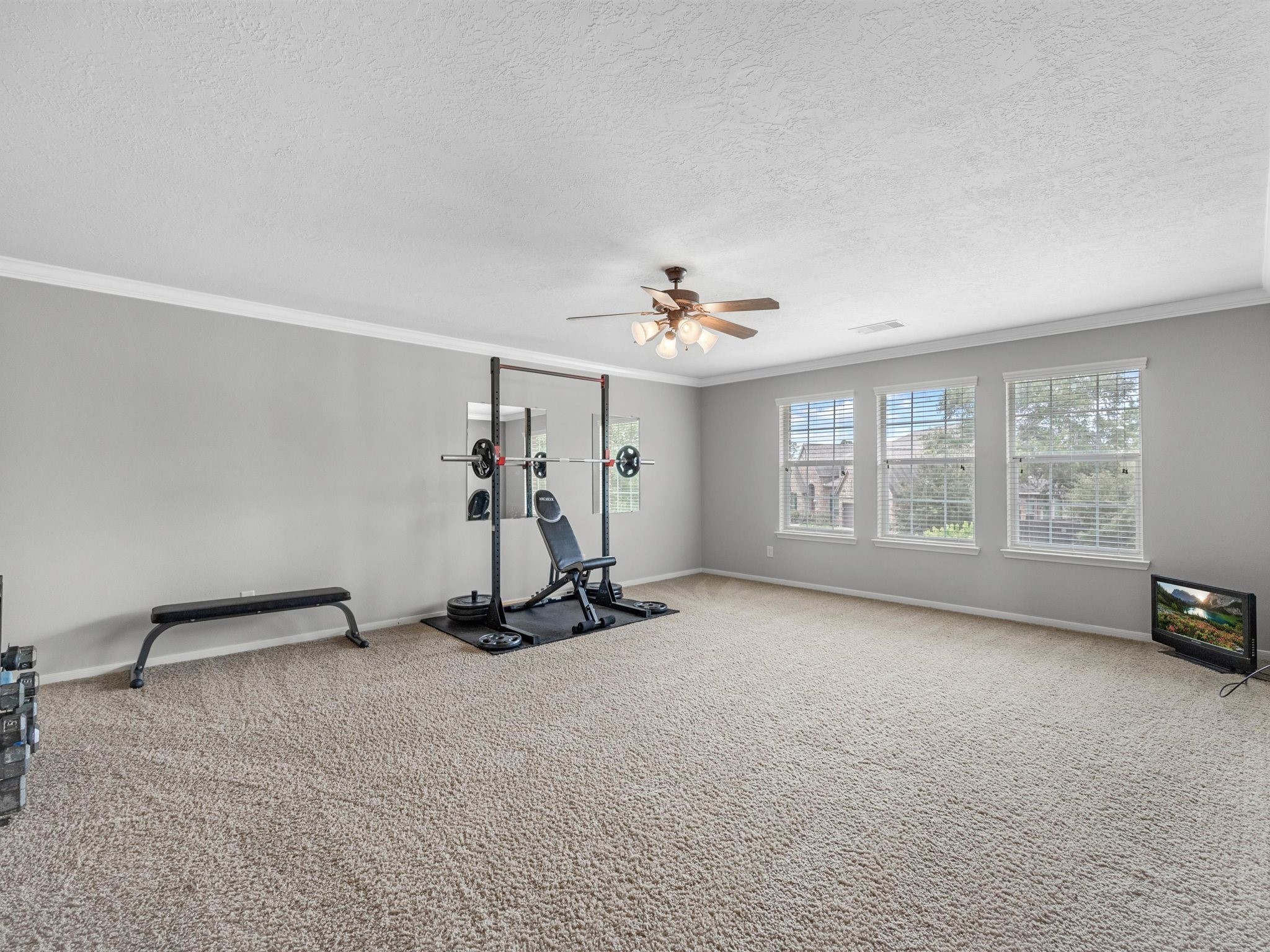 3310 Compass Court Conroe, TX 77301 - Photo 26 of 38 a view of a room with gym equipment
