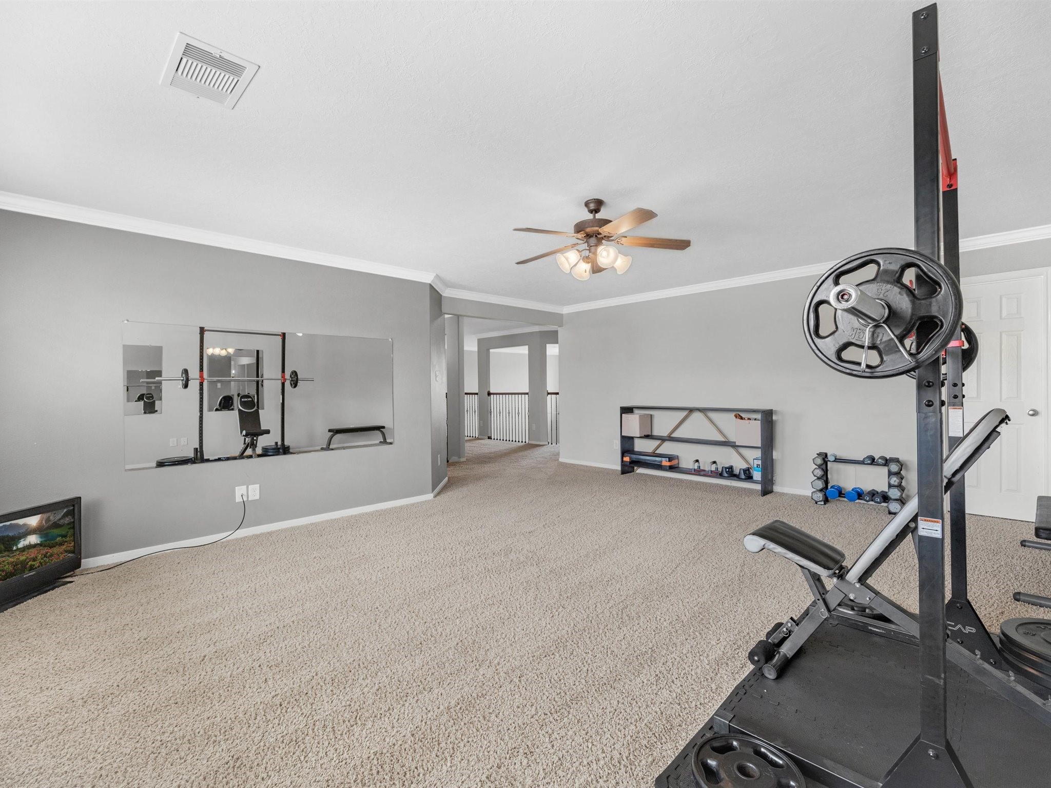3310 Compass Court Conroe, TX 77301 - Photo 27 of 38 a view of a livingroom with furniture and a chandelier