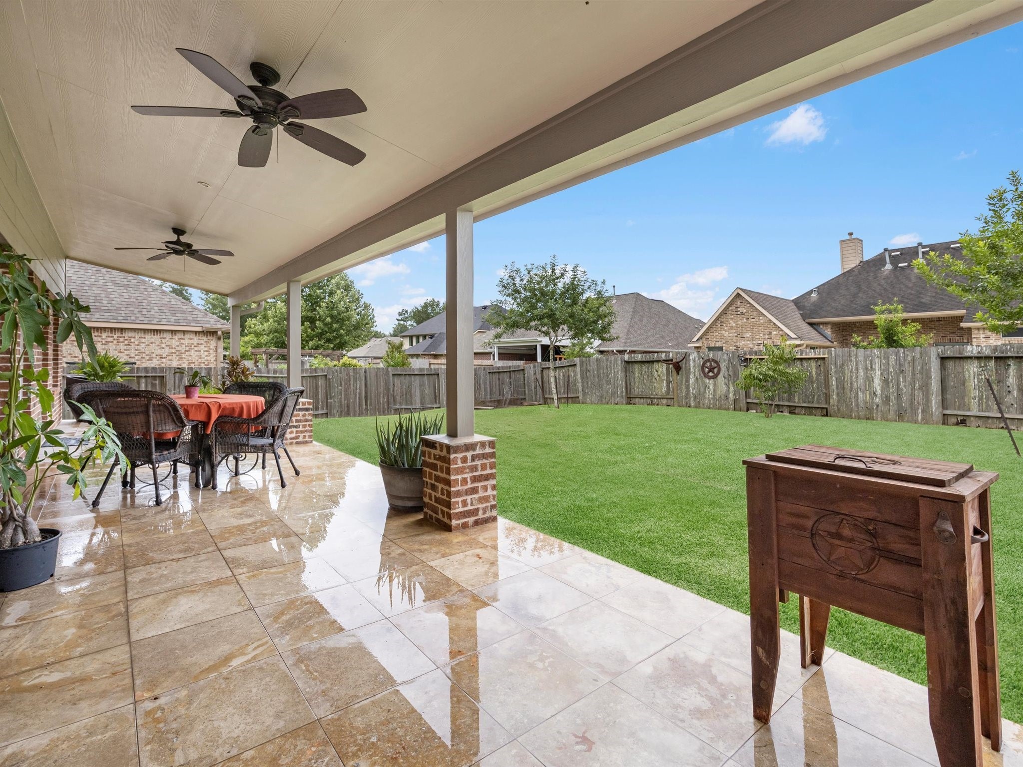 3310 Compass Court Conroe, TX 77301 - Photo 3 of 38 a view of a patio with a backyard