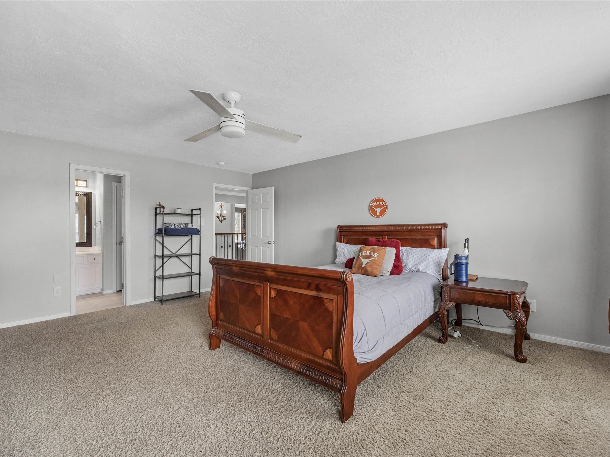 3310 Compass Court Conroe, TX 77301 - Photo 31 of 38 a bed sitting in a room with furniture and closet