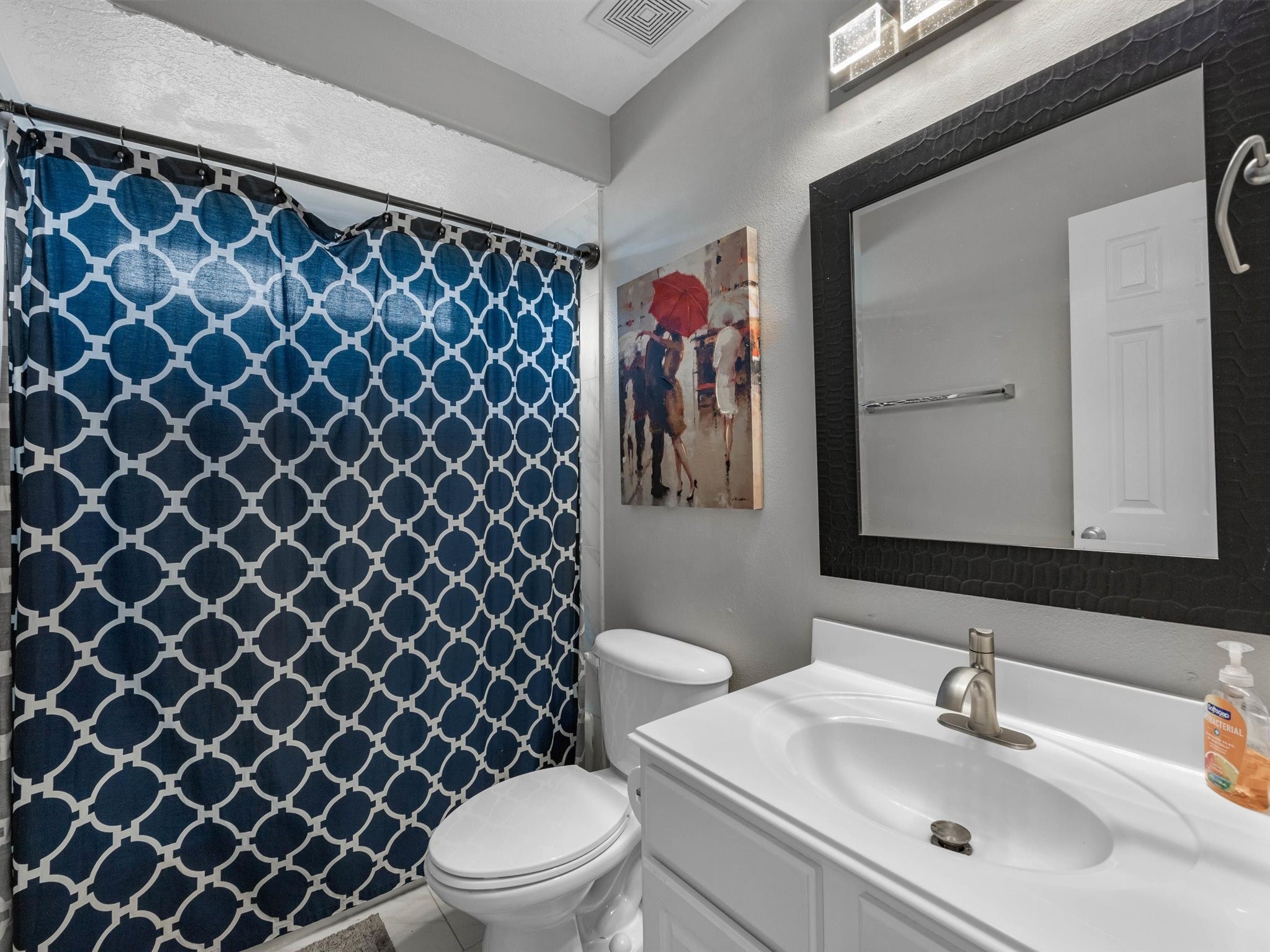 3310 Compass Court Conroe, TX 77301 - Photo 34 of 38 a bathroom with a sink and a toilet