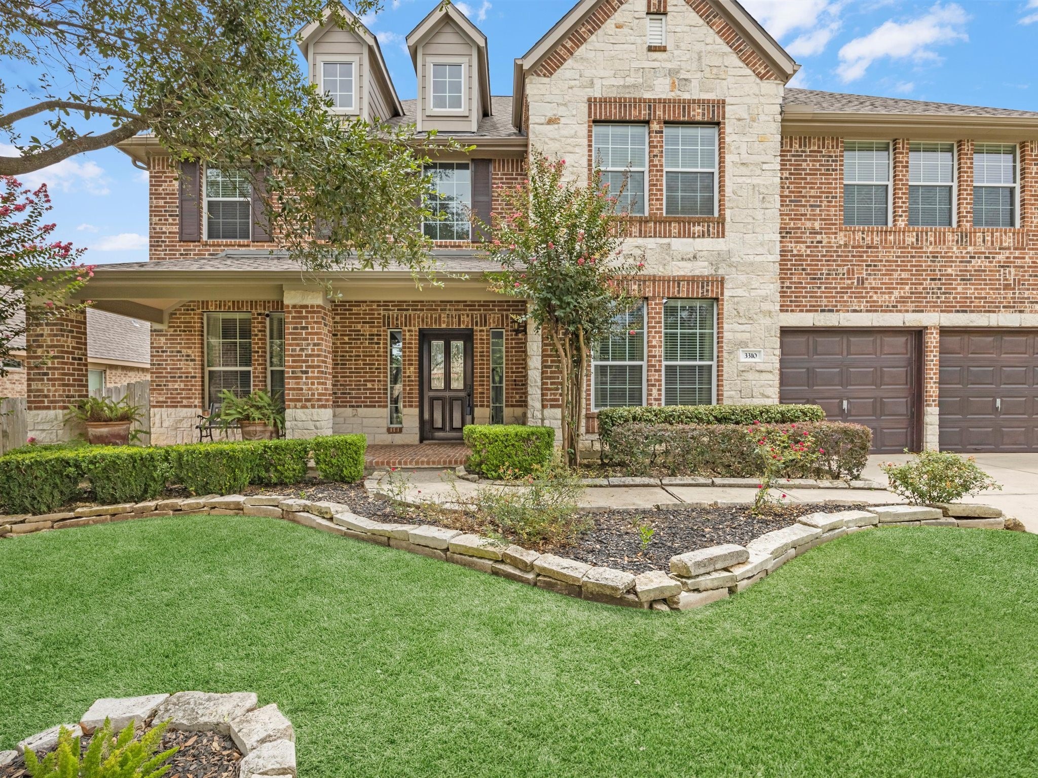 3310 Compass Court Conroe, TX 77301 - Photo 6 of 38 front view of a house with a yard