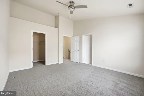 a view of an empty walk in closet