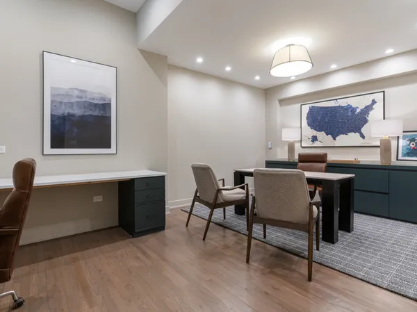 a view of a dining room with furniture
