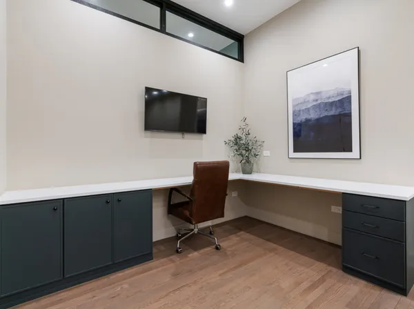 a view of a workspace with furniture