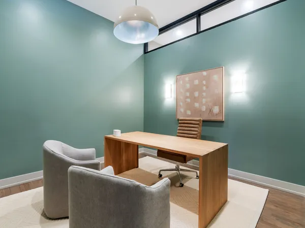 a room with furniture and a window