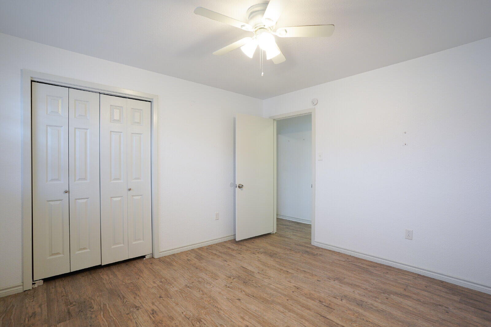 2826 54th Street Lubbock, TX 79413 - Photo 17 of 32 wooden floor in an empty room