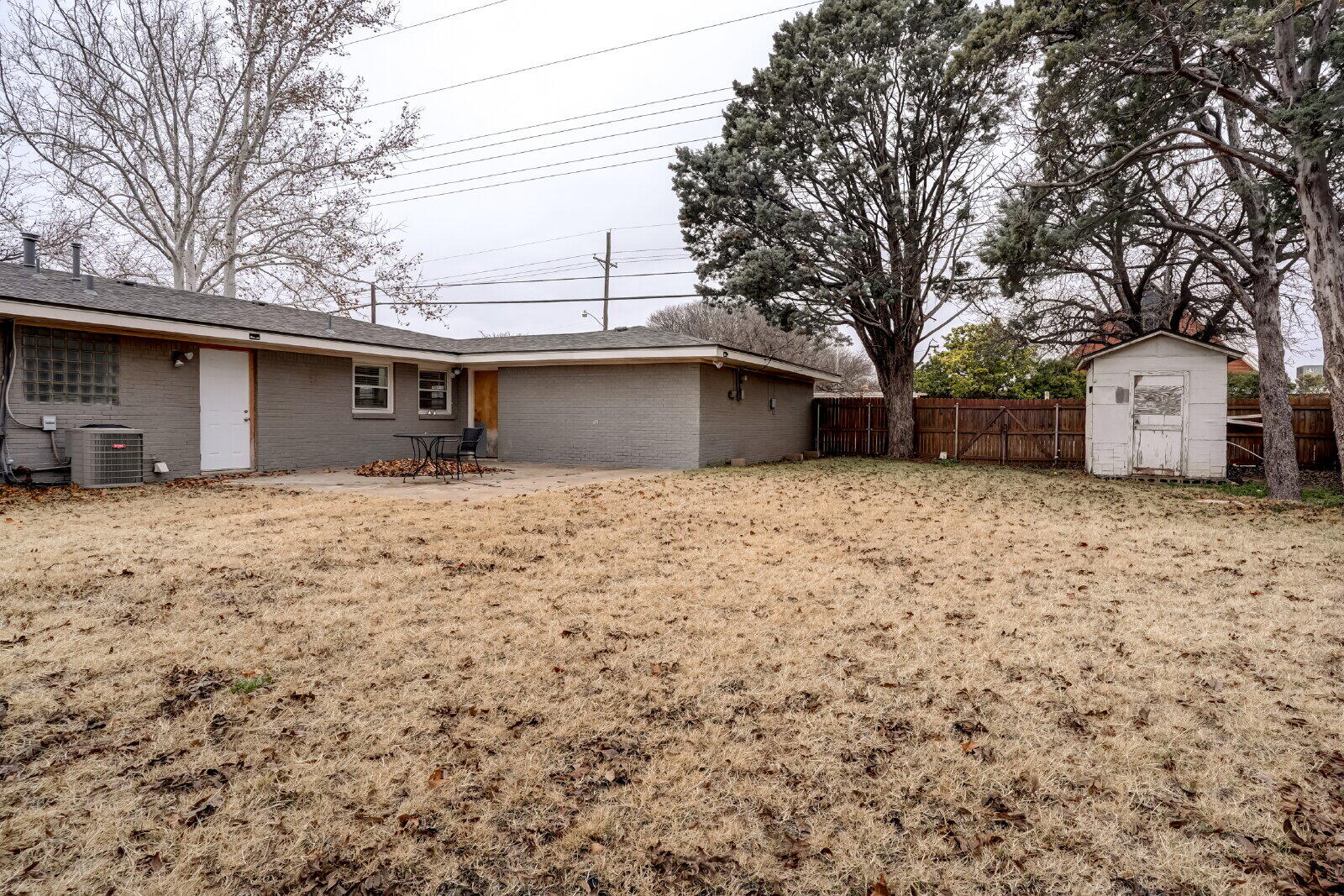 2826 54th Street Lubbock, TX 79413 - Photo 32 of 32 a house with trees in front of it