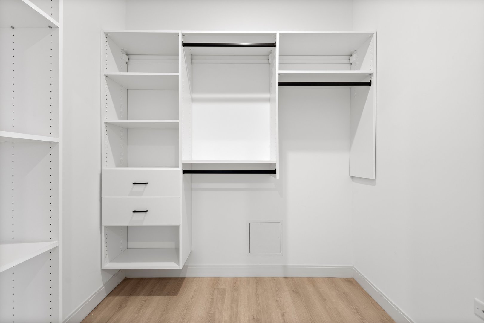 Undisclosed Address Chicago, IL 60640 - Photo 14 of 35 a view of walk in closet with empty racks