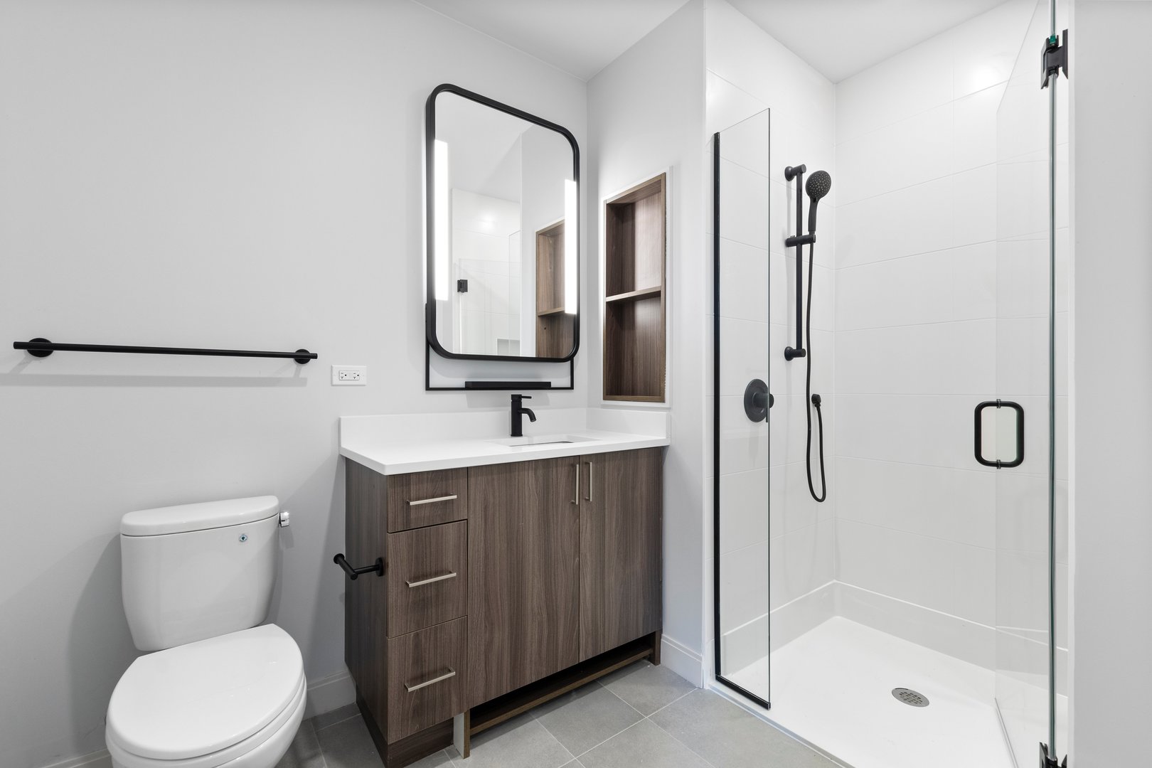 Undisclosed Address Chicago, IL 60640 - Photo 17 of 35 a bathroom with a toilet sink shower and mirror