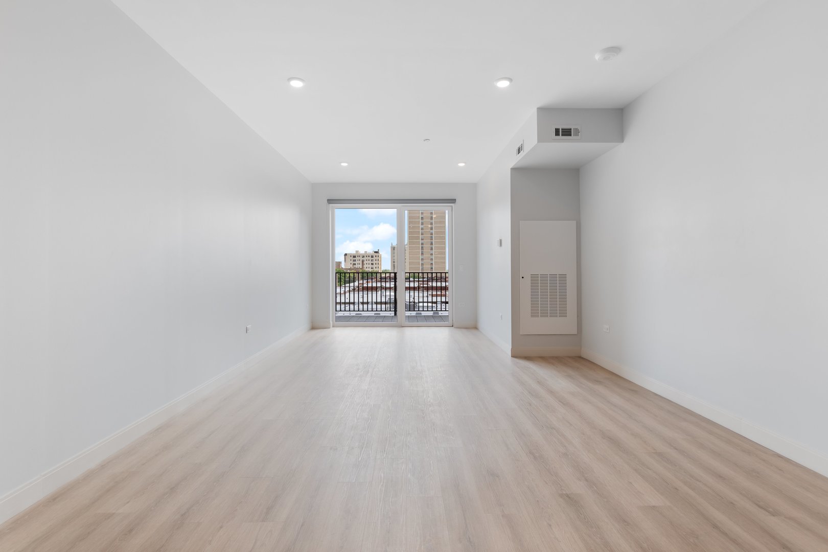 Undisclosed Address Chicago, IL 60640 - Photo 20 of 35 wooden floor in an empty room with a window