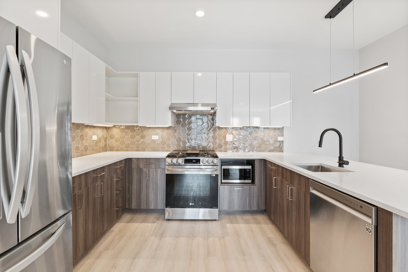 Undisclosed Address Chicago, IL 60640 - Photo 2 of 35 a kitchen with stainless steel appliances granite countertop a sink stove and refrigerator