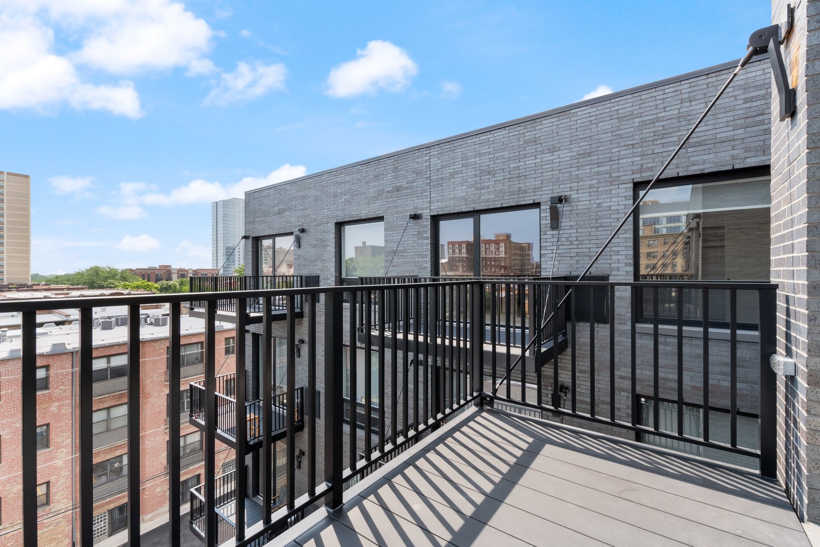 Undisclosed Address Chicago, IL 60640 - Photo 27 of 35 a view of a houses from a roof deck