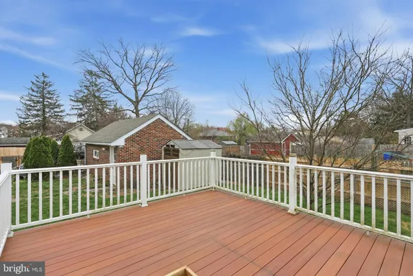 a view of a wooden roof deck