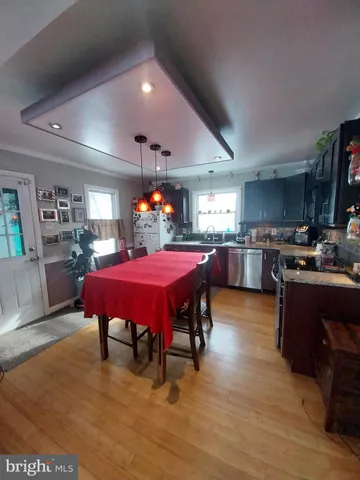 a room with furniture and pool table