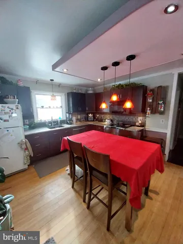 a kitchen with a stove and a sink