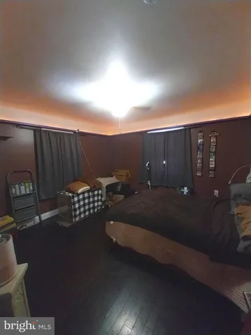 a room with gym equipment and a window