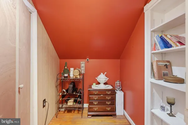 a room with a book shelf