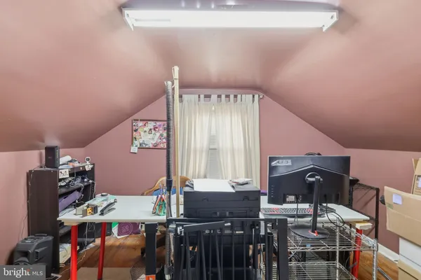 a workspace with furniture and window