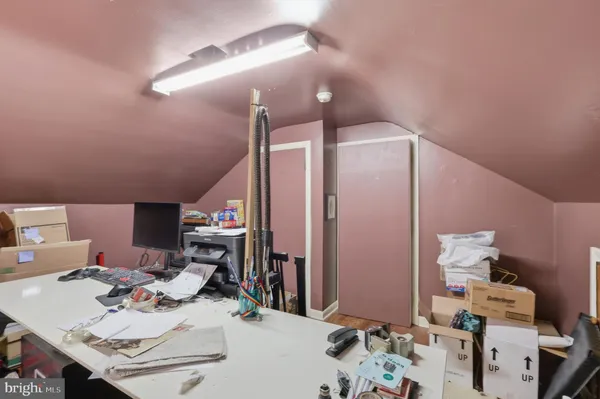 a bedroom with furniture and a bed