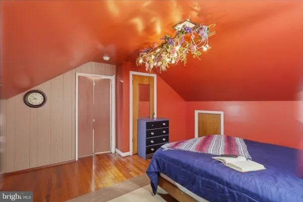 a view of a room with wooden walls