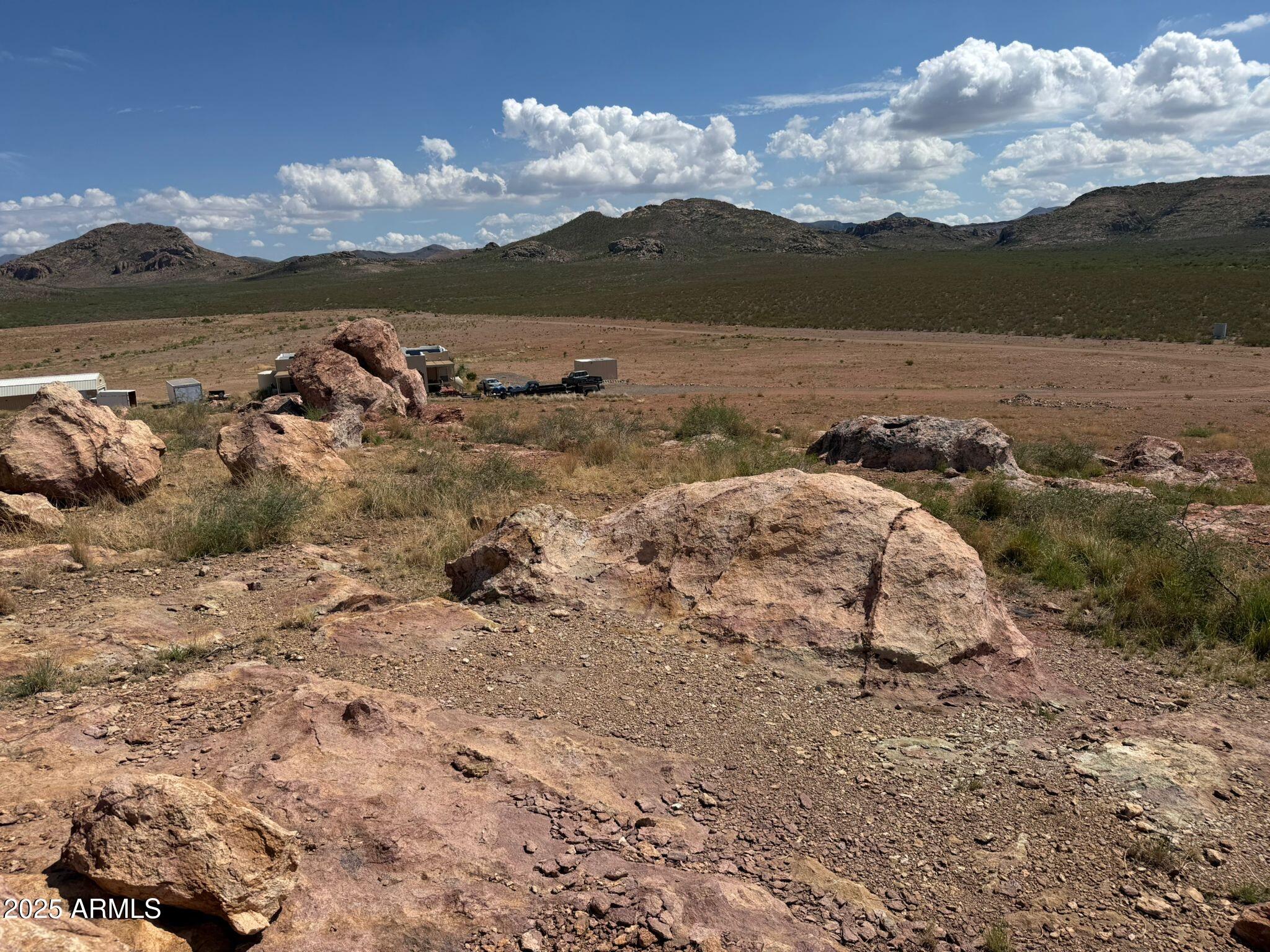 0 East Jack Rabbit Trail, Unit 9 Douglas, AZ 85607 - Photo 7 of 14 a view of a lake with a mountain