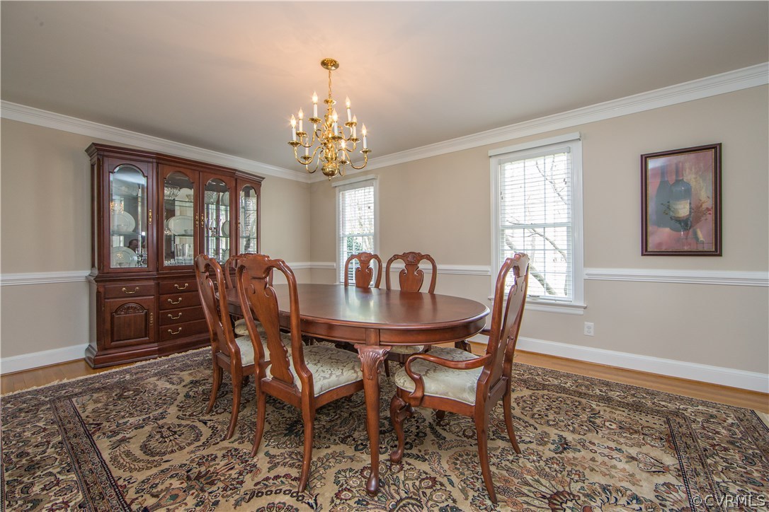12721 Foxstone Road Midlothian, VA 23113 - Photo 6 of 49 a view of a dining room with furniture