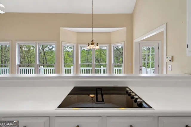 a kitchen that has a sink and a window