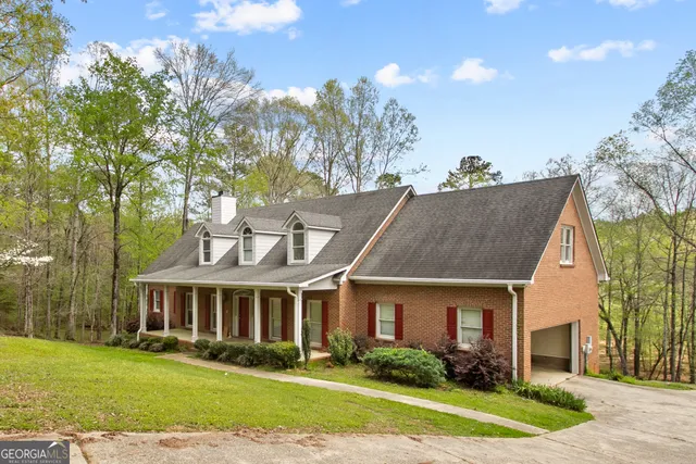 a view of a house with a garden