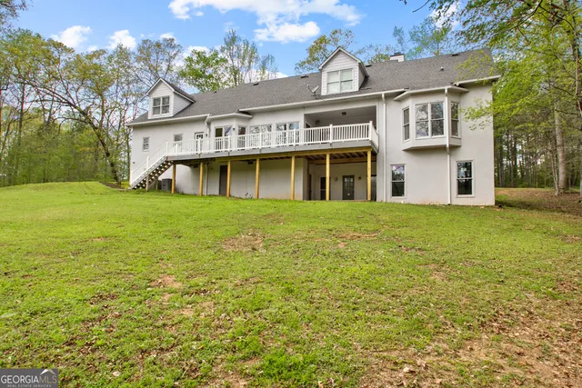 a view of a house with a garden