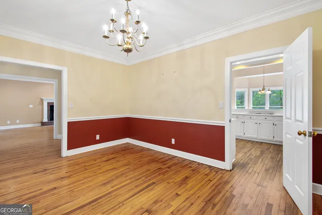 a view of a livingroom with wooden floor