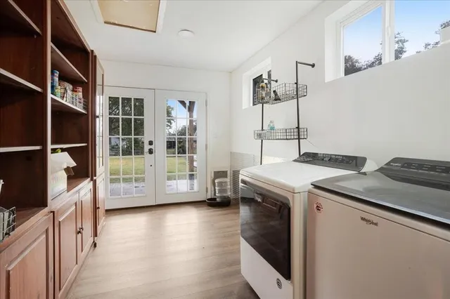 a utility room with dryer and washer