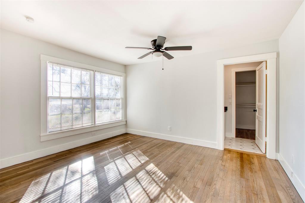 903 West 8th Street Bonham, TX 75418 - Photo 15 of 21 a view of empty room with wooden floor and fan