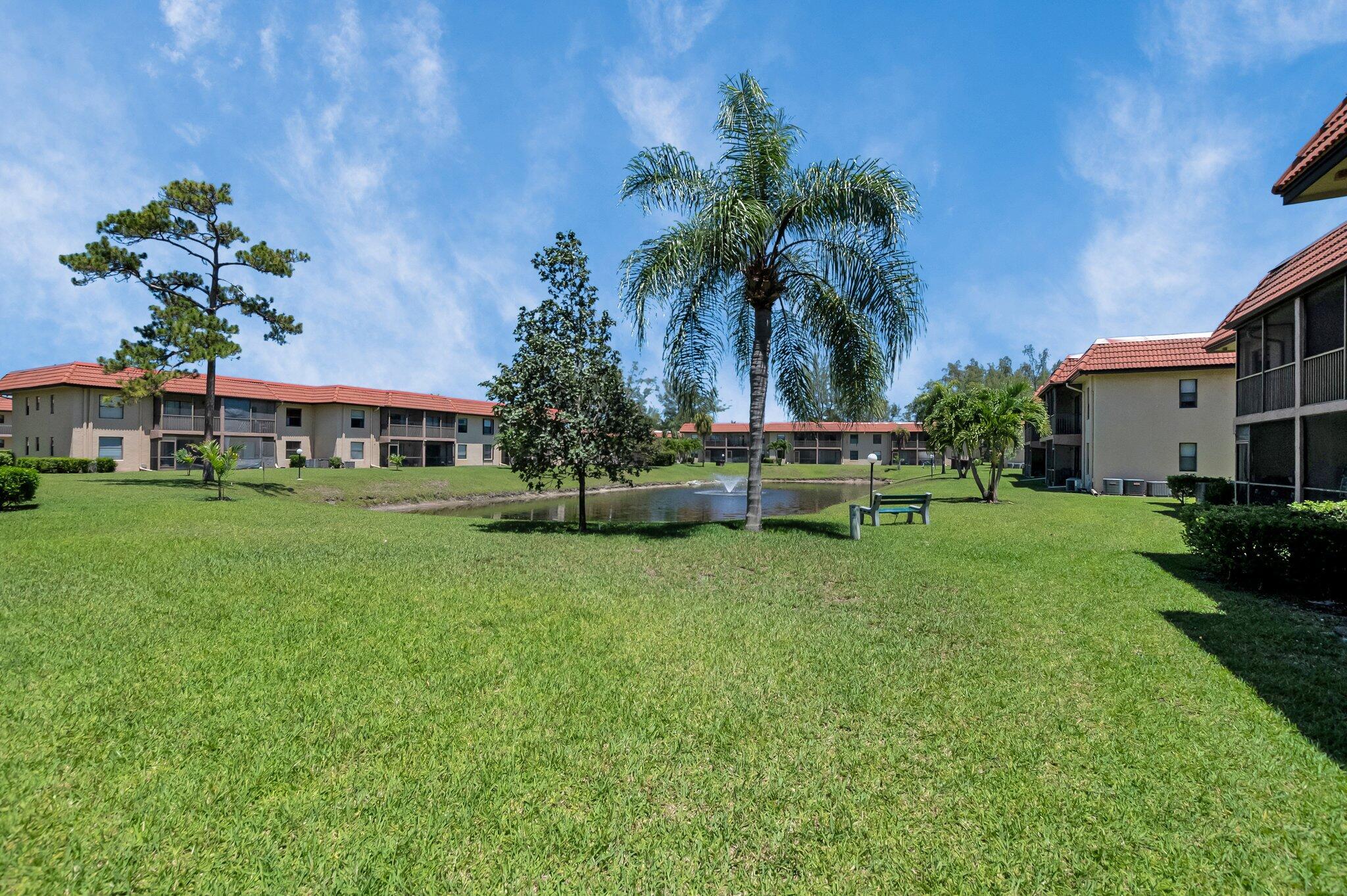 21911 Lake Forest Circle, Unit 103 Boca Raton, FL 33433 - Photo 17 of 24 View of lake from outside