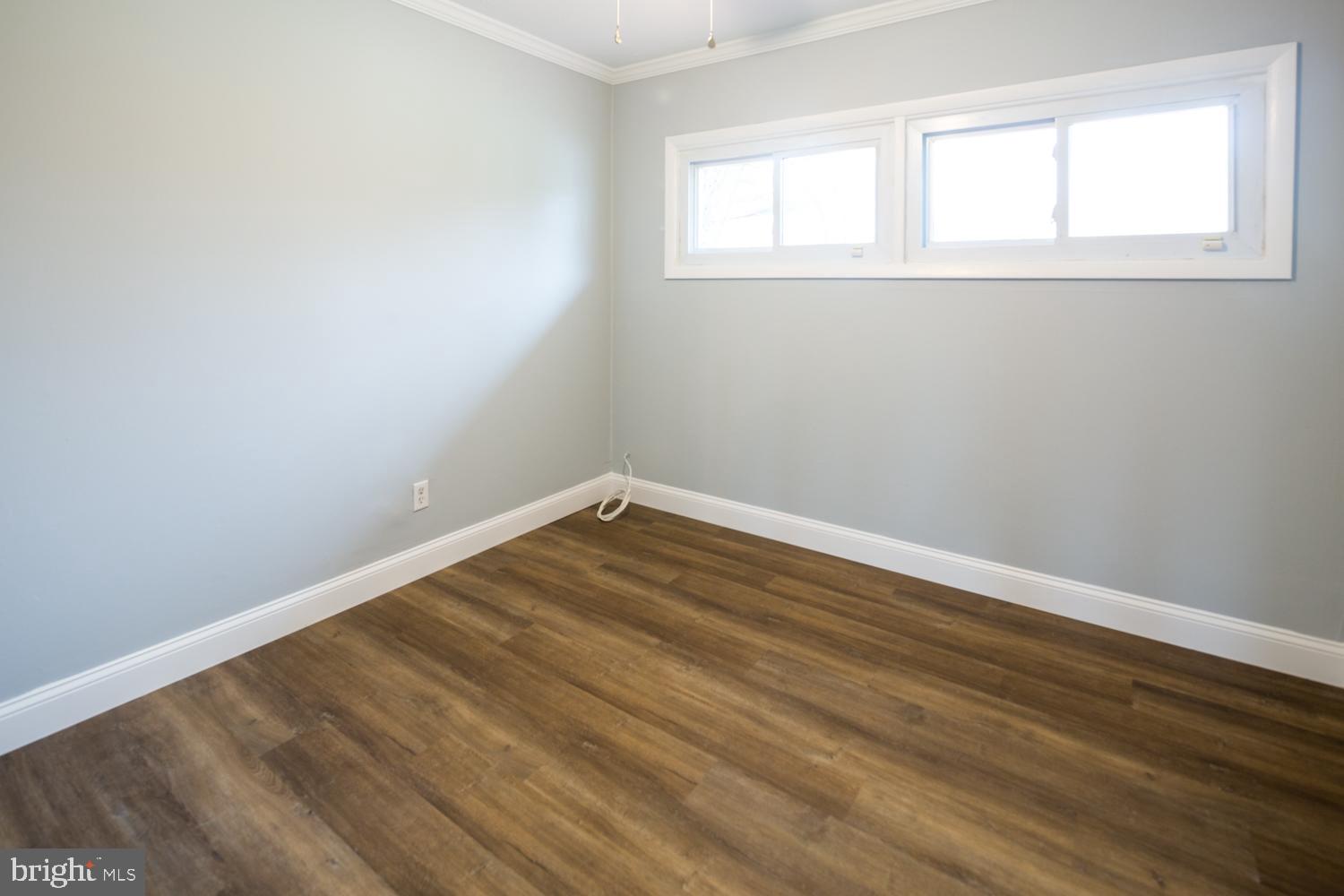 11 Carlisle Road Newark, DE 19713 - Photo 17 of 20 wooden floor in an empty room