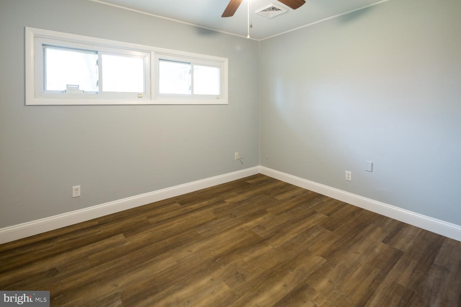 11 Carlisle Road Newark, DE 19713 - Photo 9 of 20 a view of a room with wooden floor and natural light