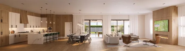 a living room with furniture and large windows