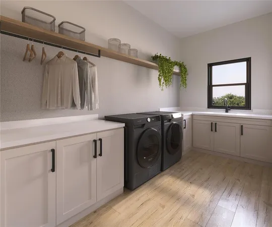 a utility room with dryer and washer