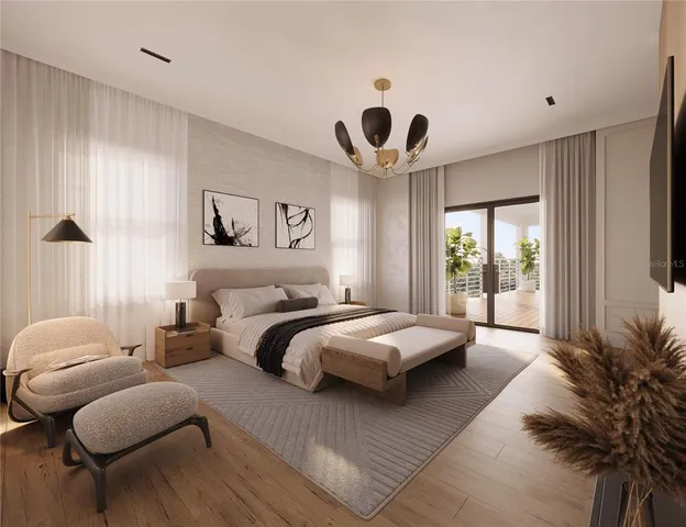 a bedroom with a bed and a large window