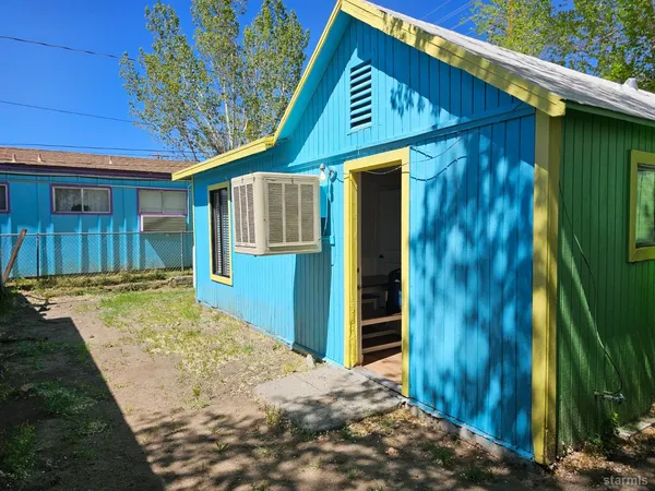 a view of a house with a small cabin