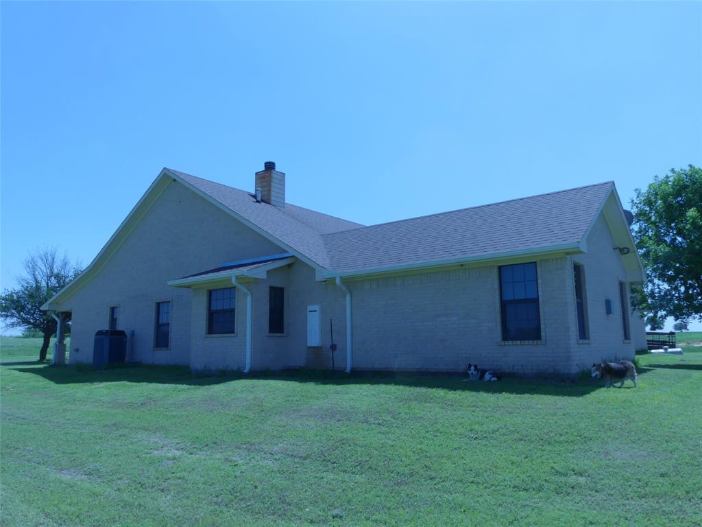 3421 Schoolhouse Road Forestburg, TX 76239 - Photo 24 of 39 front view of a house with a yard