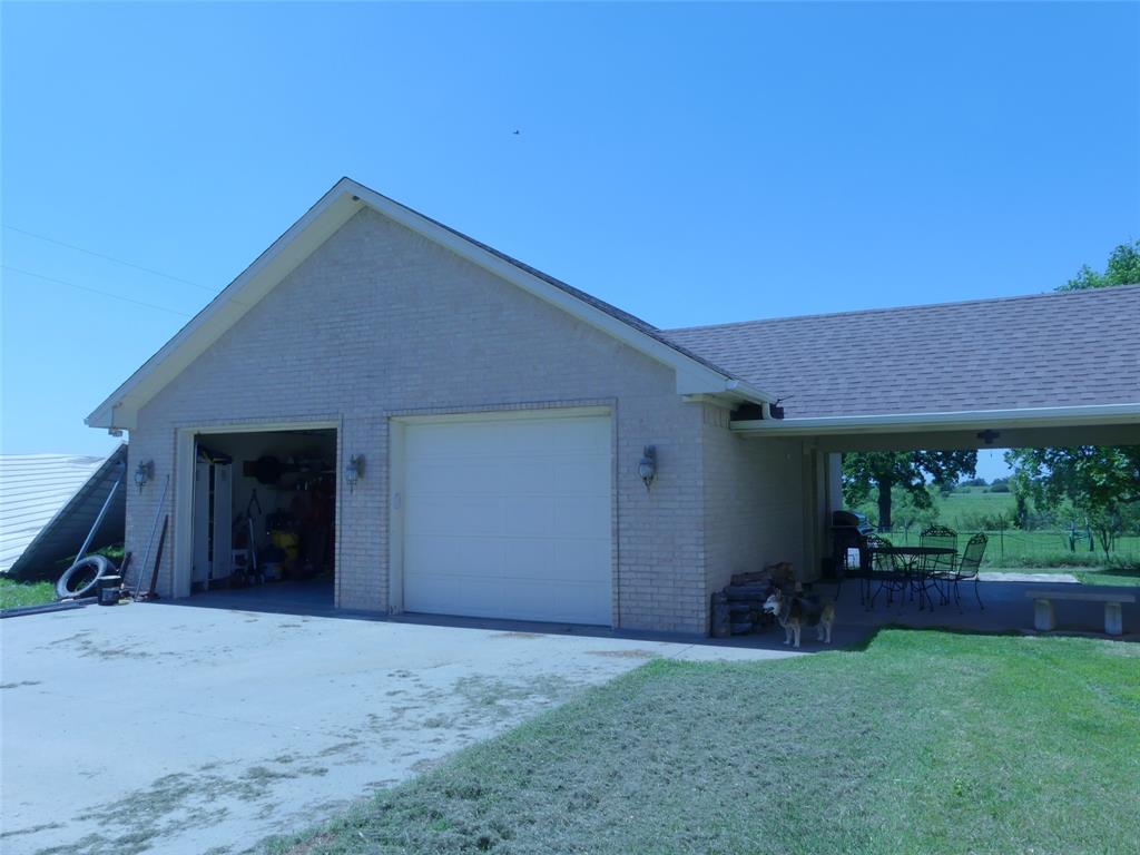 3421 Schoolhouse Road Forestburg, TX 76239 - Photo 26 of 39 a backyard of a house